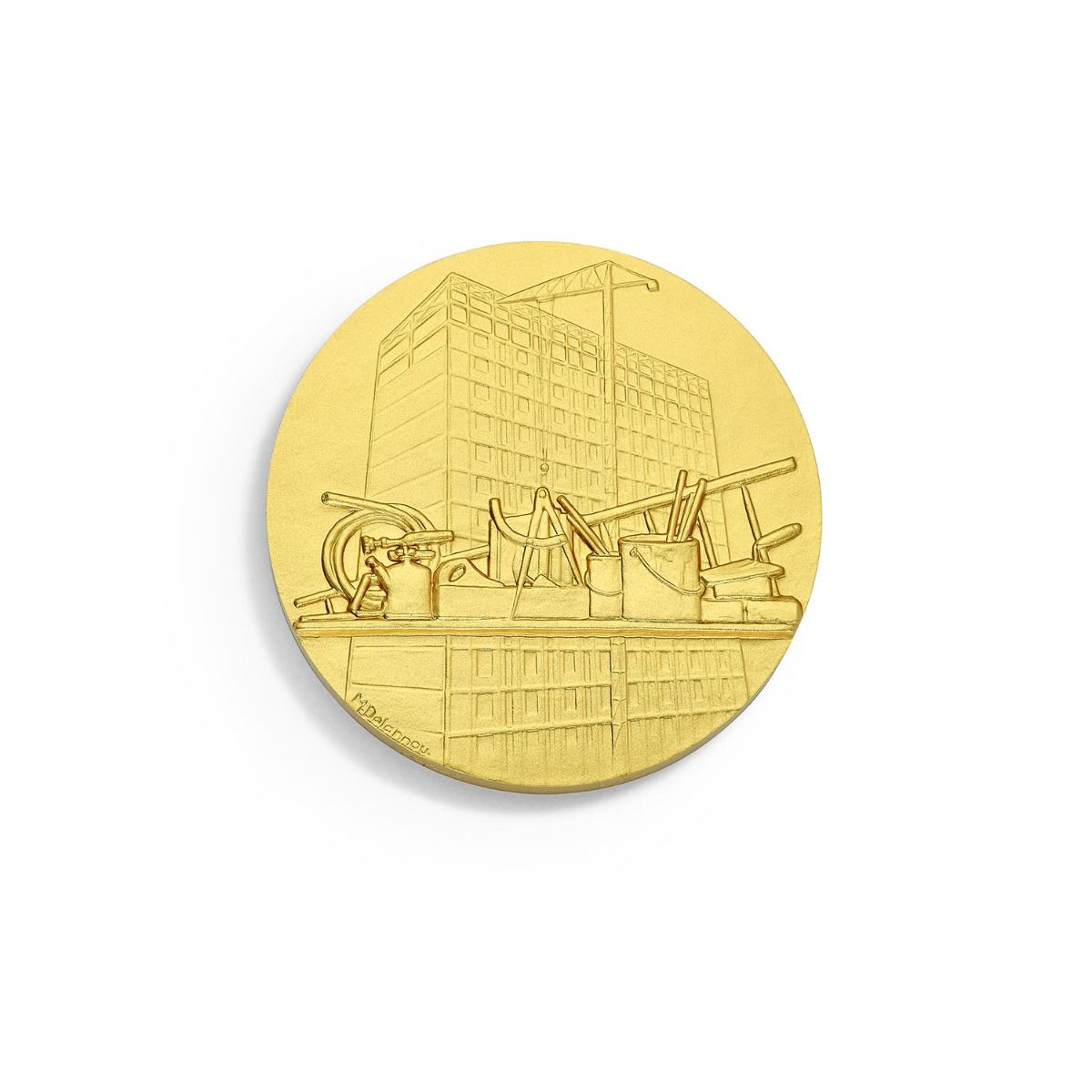 médaille bâtiment dorée
